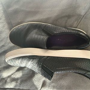 Black and white slip on shoes